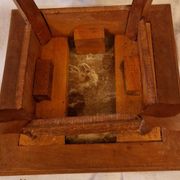 Antique Art Nouveau pedestal table with carved wood and marble top.