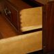 Crocodile leather and hardwood luggage rack in Mid-Century Modern style