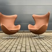 2x Fritz Hansen Egg chair by Arne Jacobsen in Cognac leather, new condition!