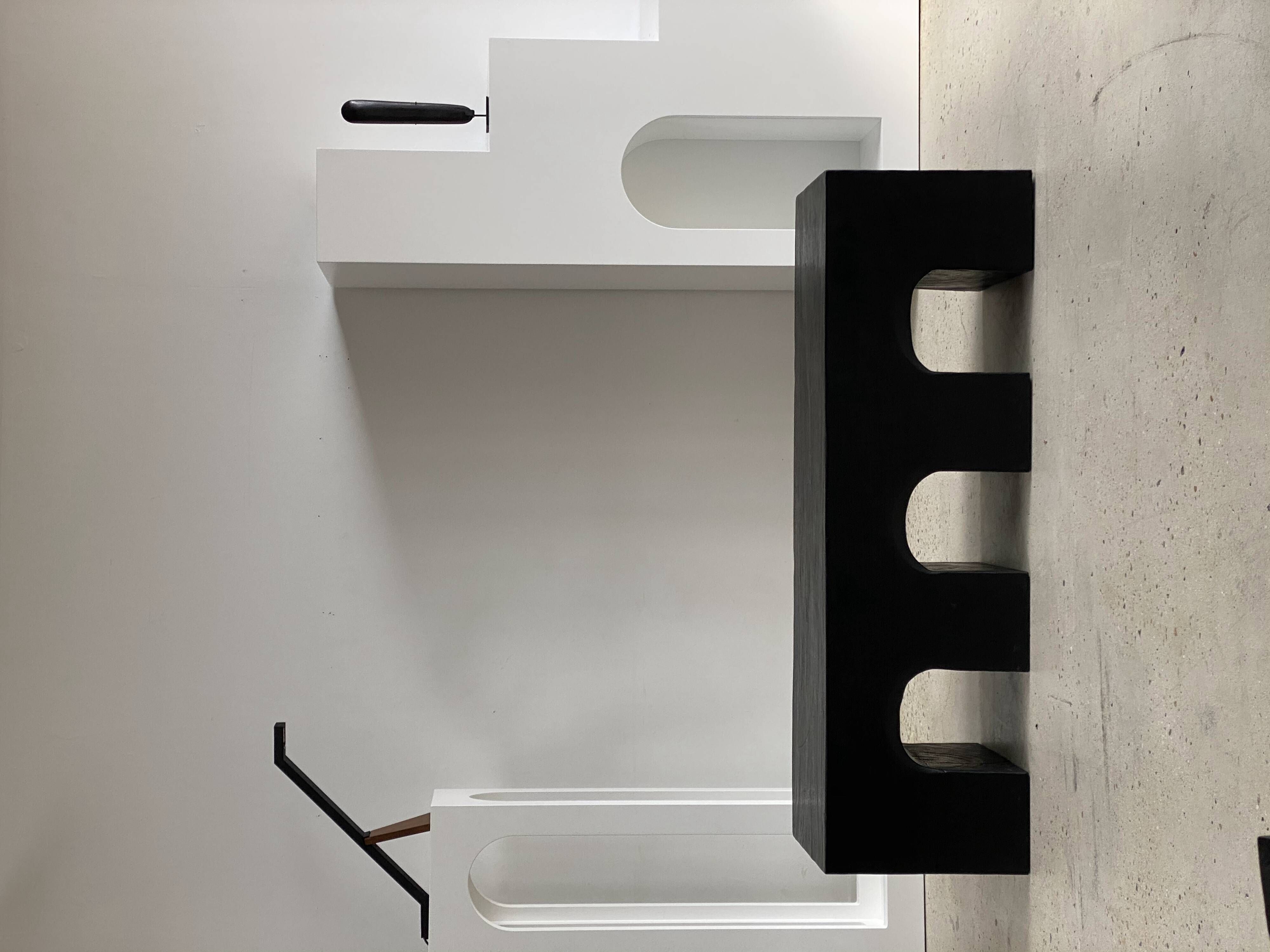 Bench in solid monoxyl wood, carved base in 3 arches - Black color