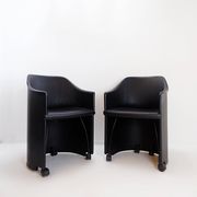 Pair of Artona armchairs in black leather by Afra and Tobia Scarpa for Maxalto.
