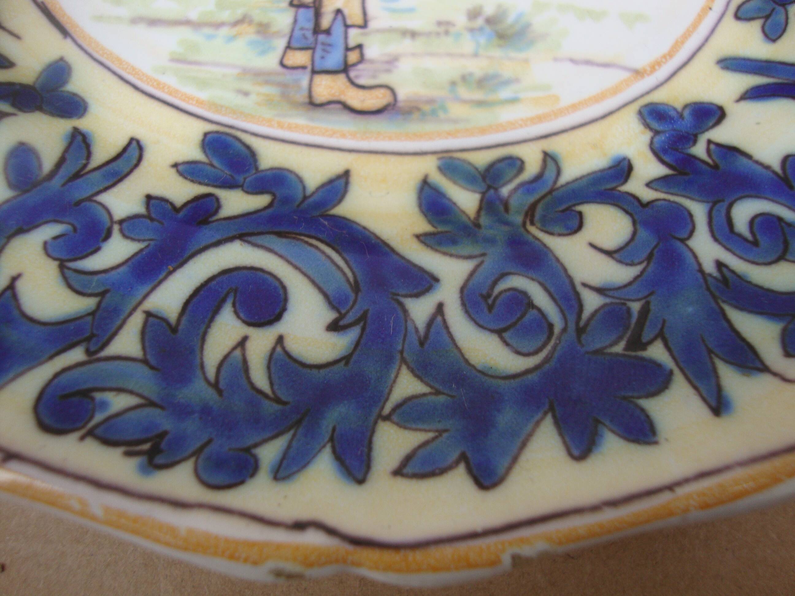 Old earthenware plate decorated with a character marked Le HAVRE