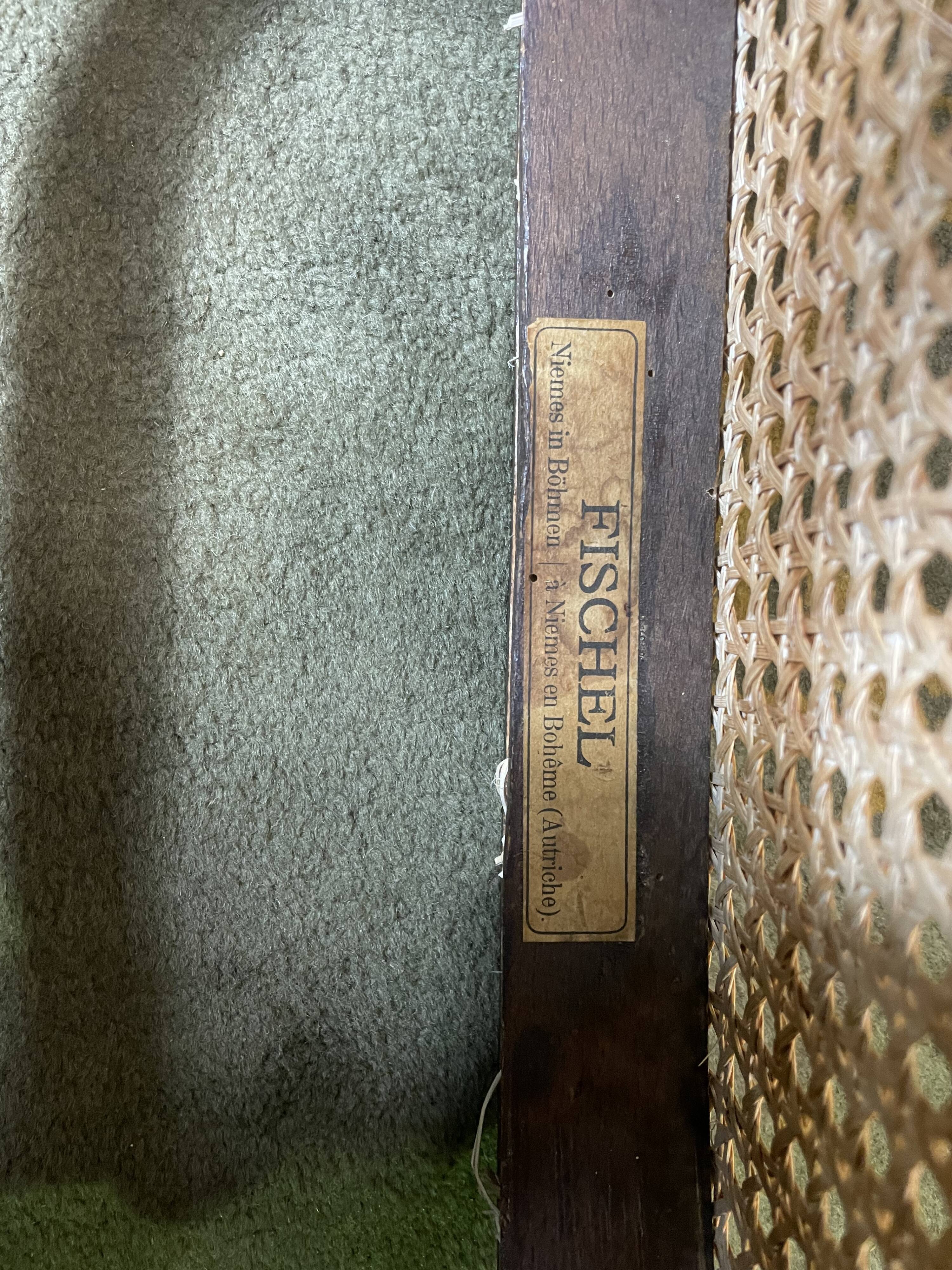 Suite de 6 chaises bistrot en cannage Fischel