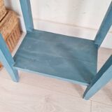 Blue wooden bedside tables with floral patterns