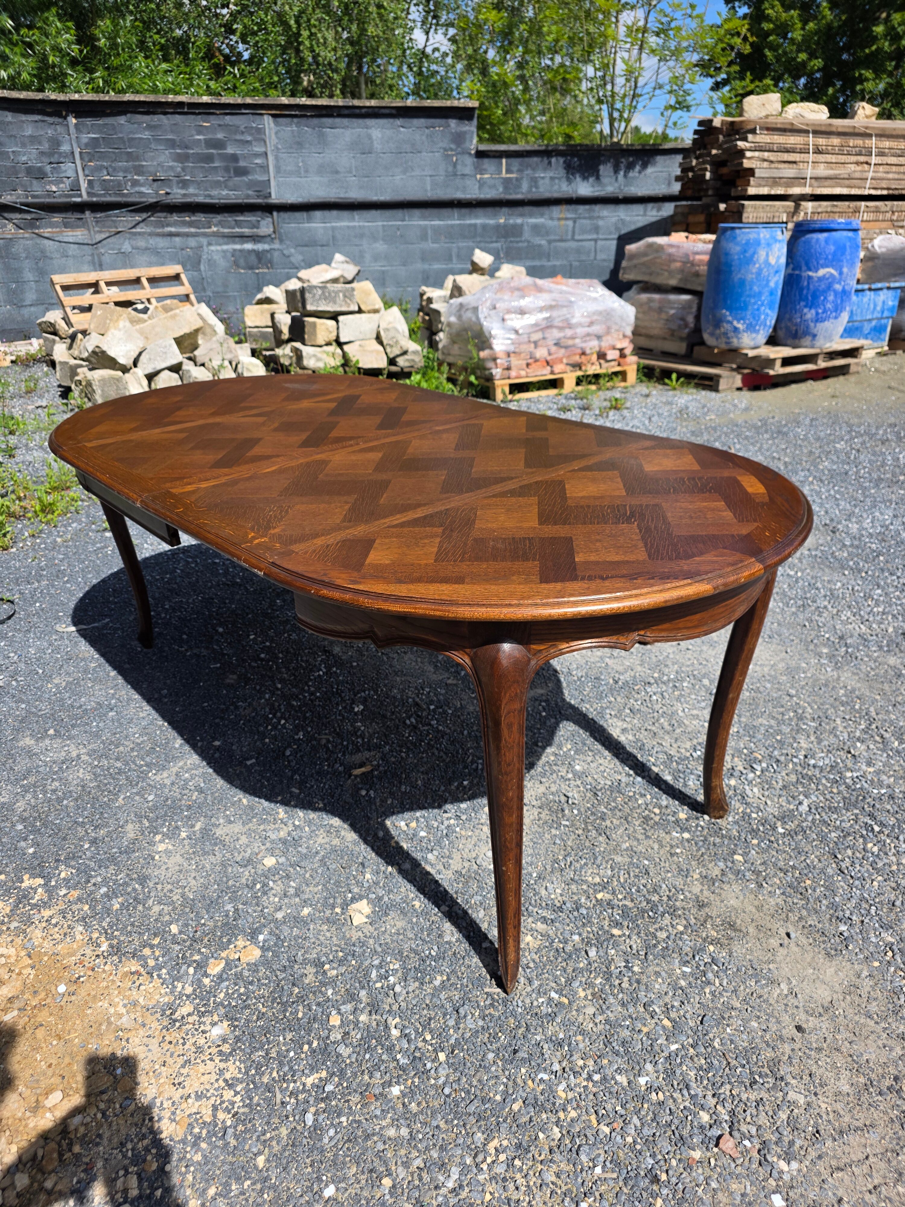 Extendable table in Louis XV style in oak (2 extensions)