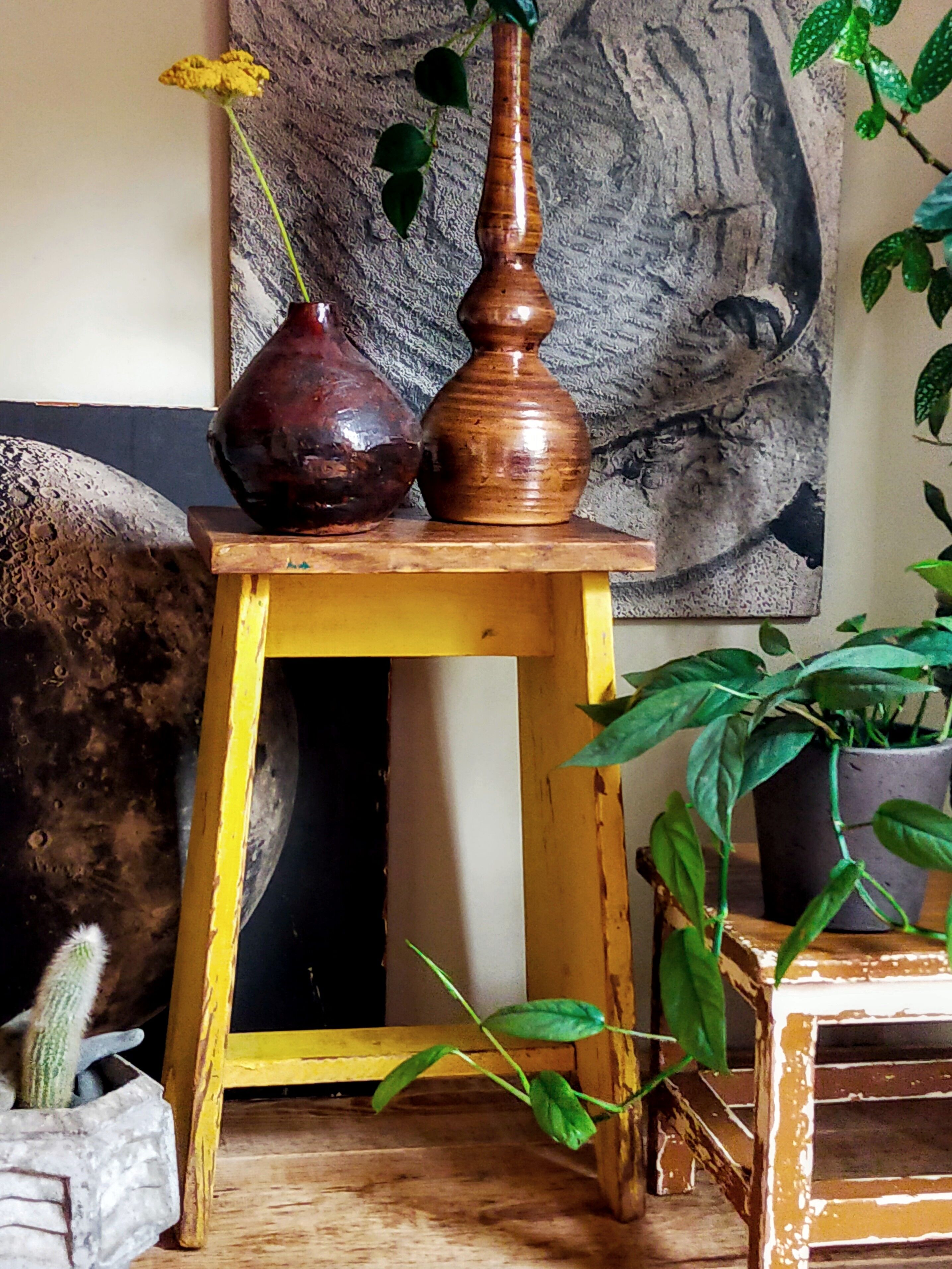 Art-populaire workshop stool in patinated wood