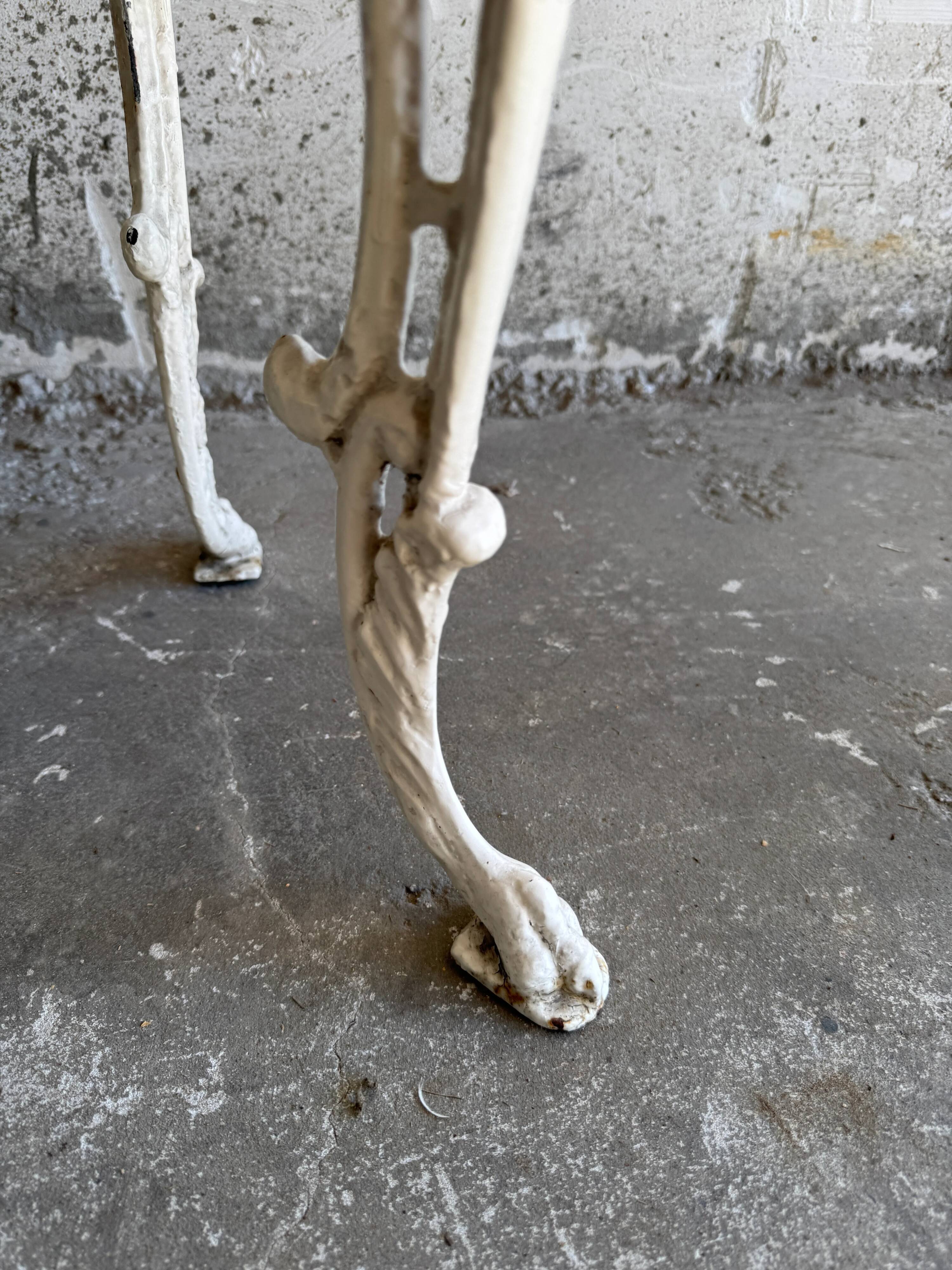 Pair of cream-white cast iron side tables with wooden tops — neoclassical shabby-chic