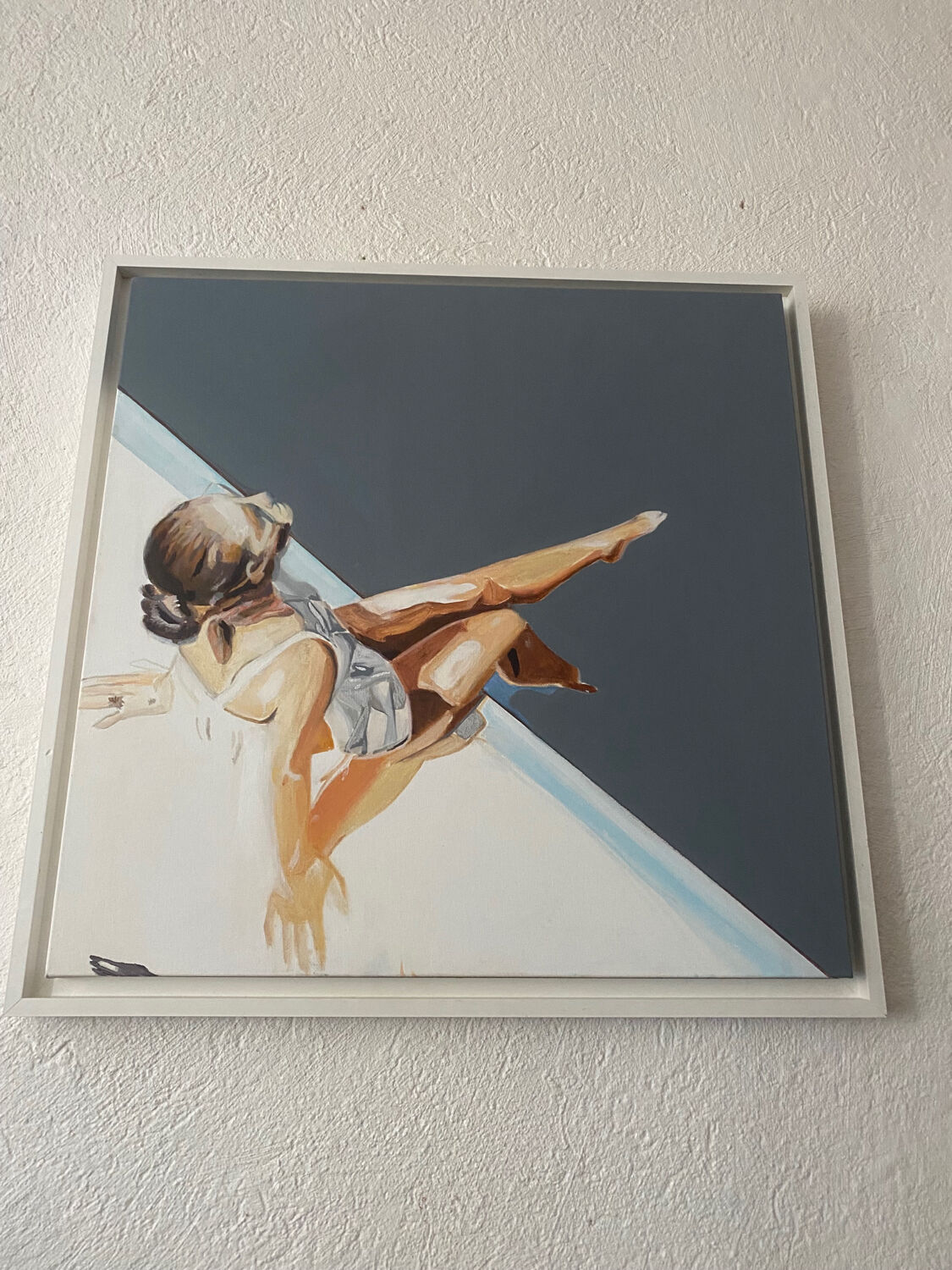 Seated woman painting