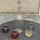 Liqueur carafe, or aperitif, carved with floral decoration in transparent glass and 4 polka dot glasses