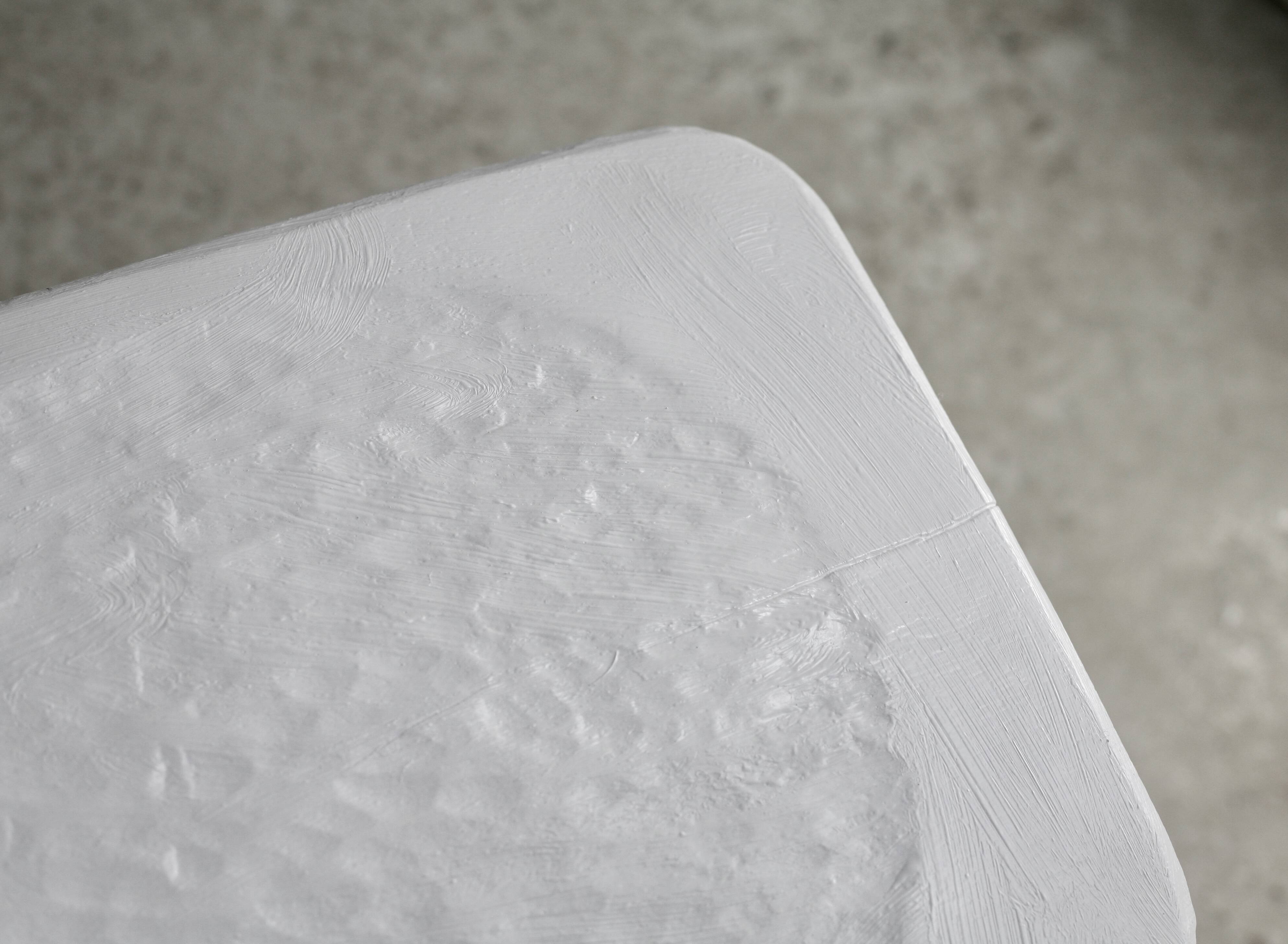 Pair of tripod chairs, gouged seats. Brutalist, circa 1960. Painted wood.