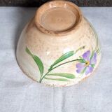 Old bowl in earthenware with floral decoration.