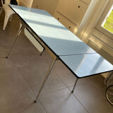 Blue Formica table for 4 to 6 people