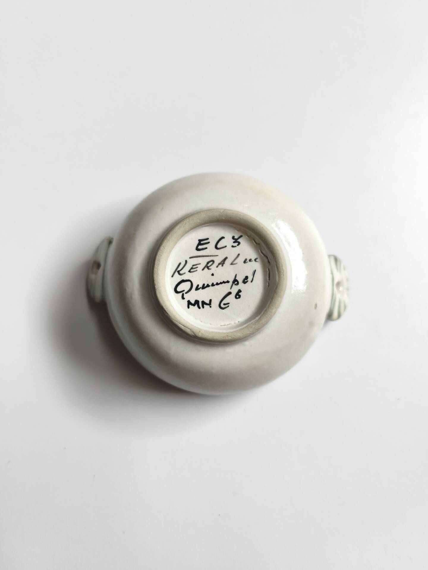 Vintage bowl signed Keraluc Quimper in yellow and green.