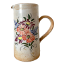 Stoneware pitcher floral decoration