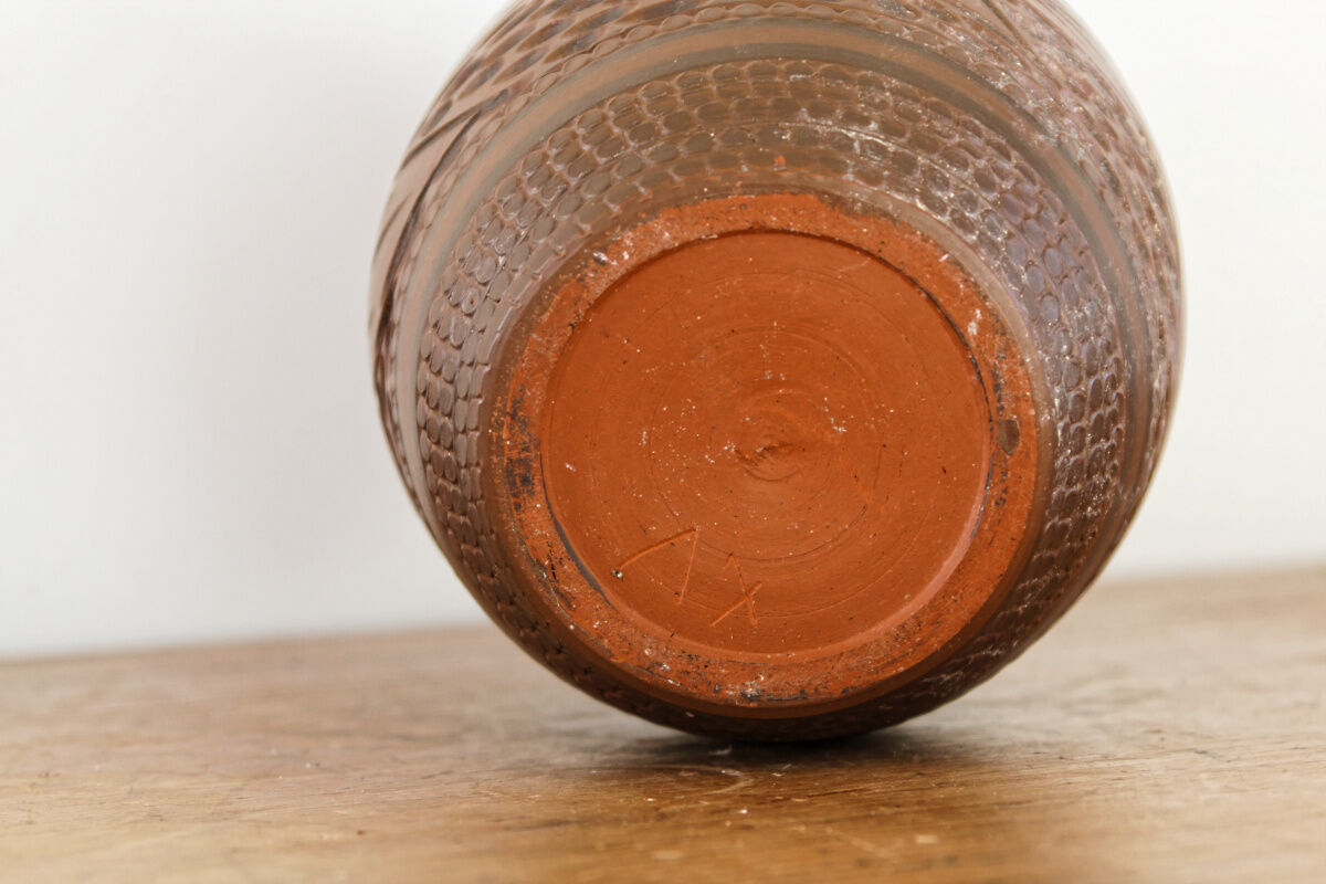 Carved terracotta vase, signed