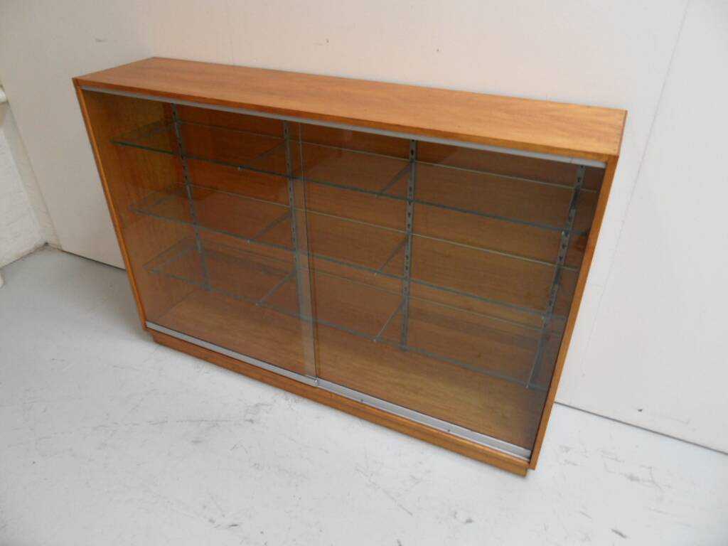 Vintage shop display cabinet with sliding doors