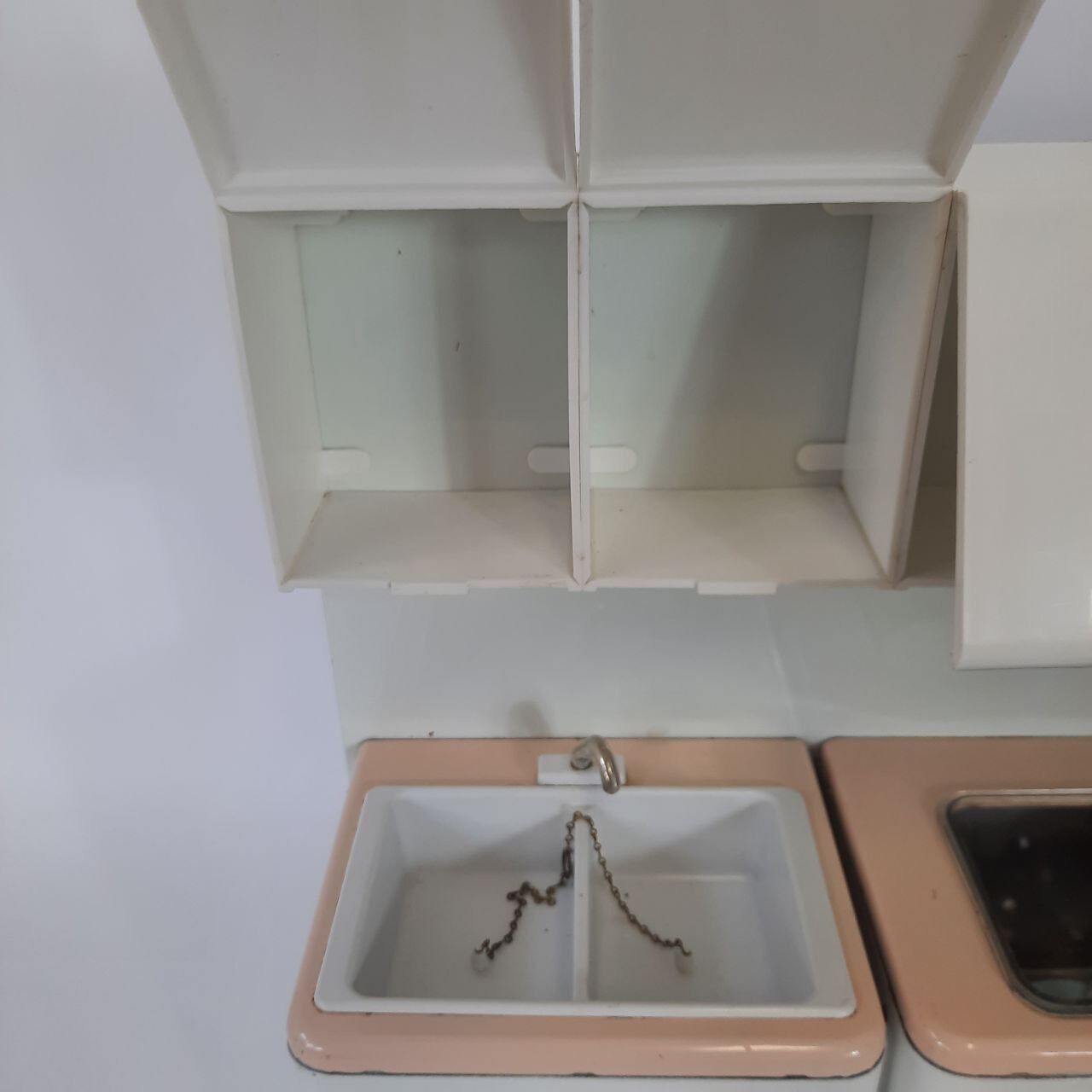 Miniature vintage toy kitchen