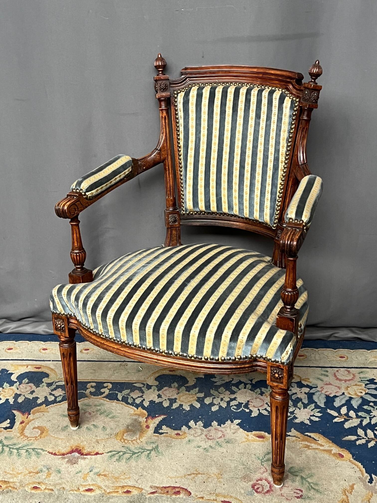 Antique Louis XVI style armchair.