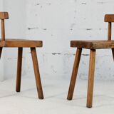 Pair of tripod stools with brutalist backrests, France, circa 1960