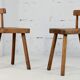 Pair of tripod stools with brutalist backrests, France, circa 1960