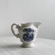 Porcelain sauce boat with blue pastoral pattern