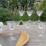 11 bottle-bottom bistro glasses with silver edging, early 20th century