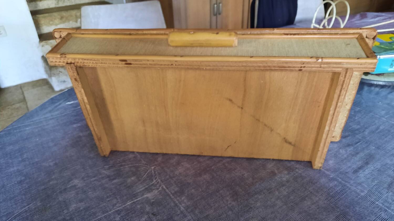 Rattan and bamboo wall shelf