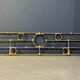 Architectural brutalist wall mounted sculpture made from cast metal.