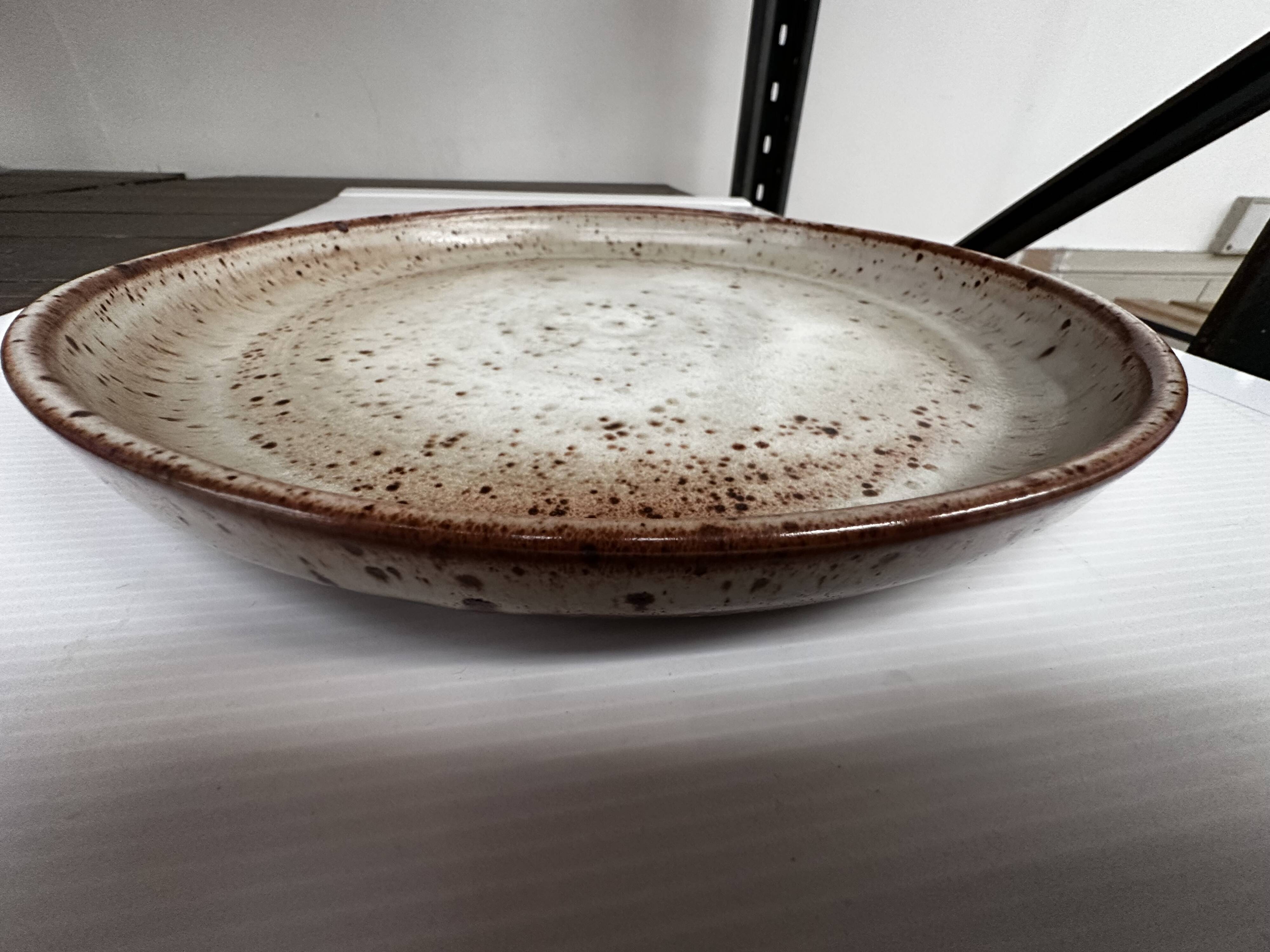 Large round stoneware dish signed Vallauris origin Diameter 30 cm