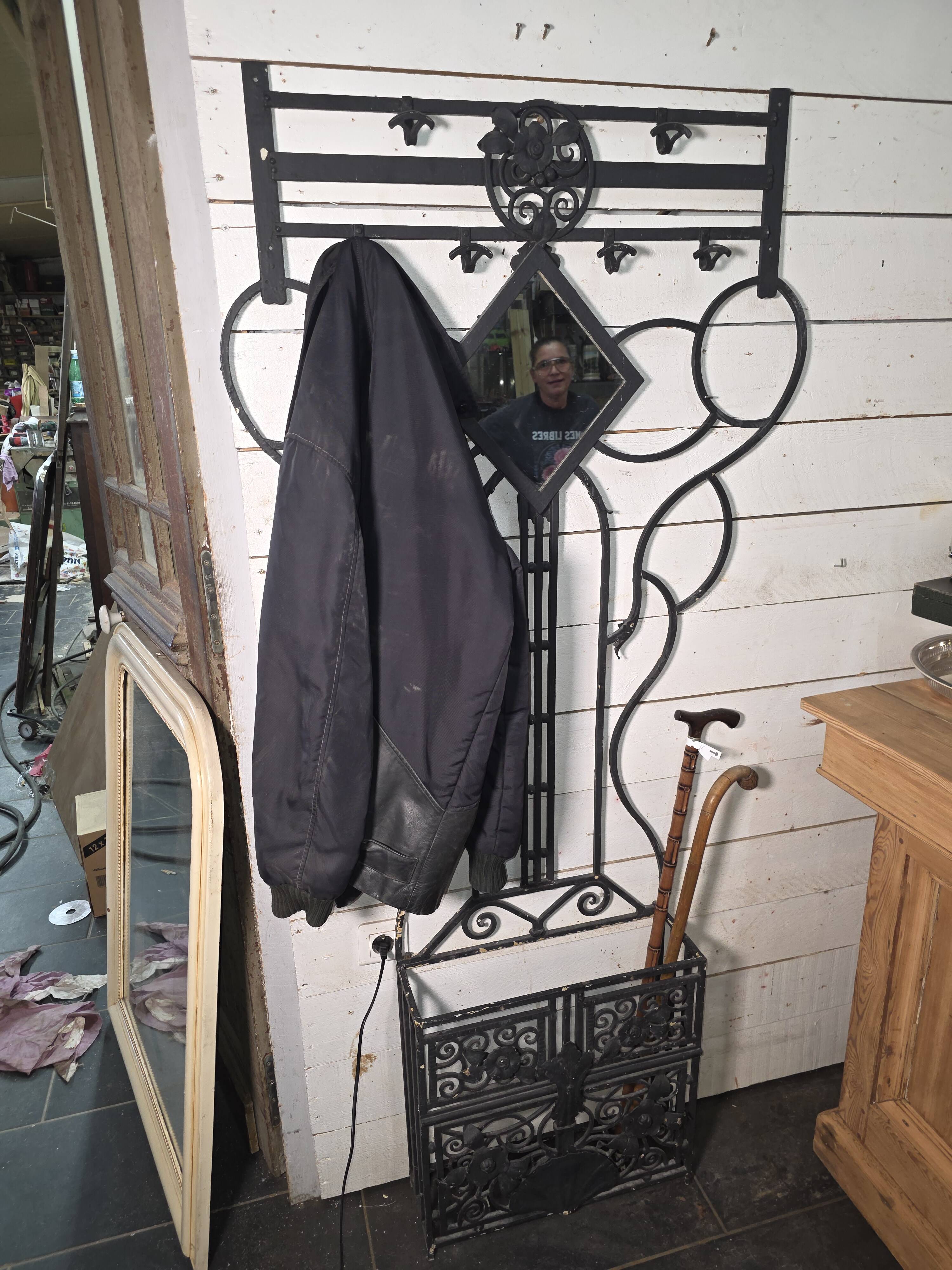 Art Deco coat rack wardrobe in wrought iron from the 1930s.