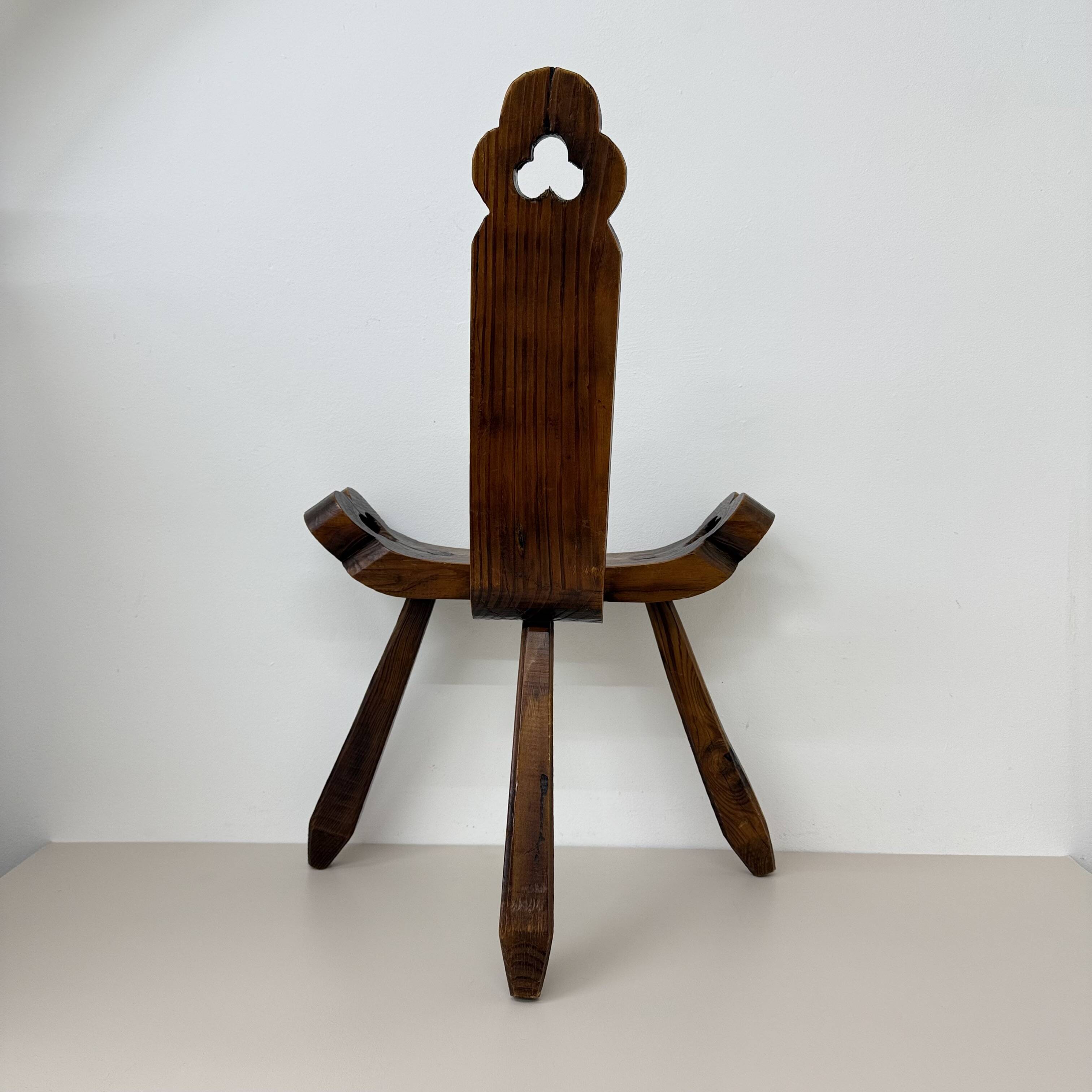 Brutalist hand carved oak Spanish tripod chair , 1970s