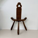 Brutalist hand carved oak Spanish tripod chair , 1970s