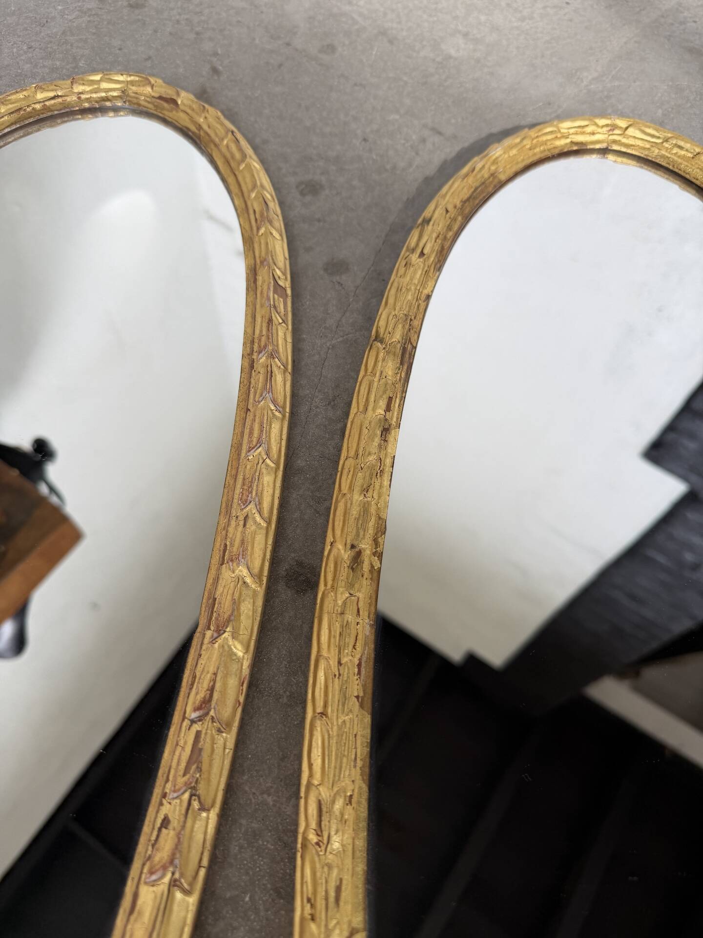 Pair of oval mirrors 1900 gilded stucco