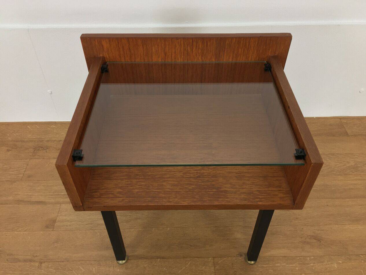 Modernist bedside table from the 1950s, wood and glass.