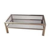 Table basse des années 70 en métal doré et verre fumé