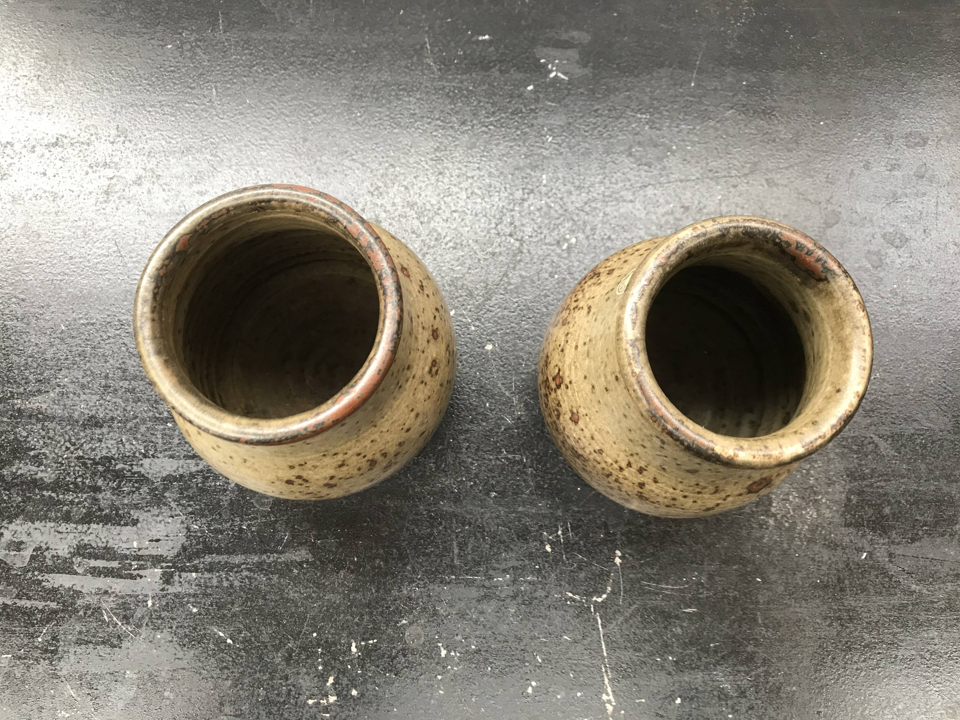 Pair of old vintage Jean Tessier sandstone cep vases