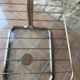 Glass and brass side table with magazine rack, circa 1970's