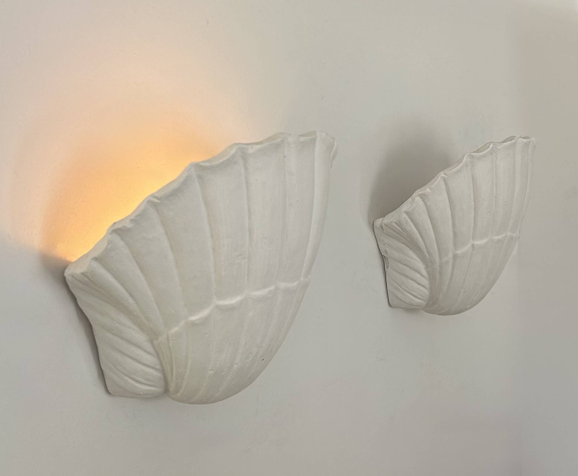 Pair of vintage seashell wall sconces, matte white plaster, France 1970