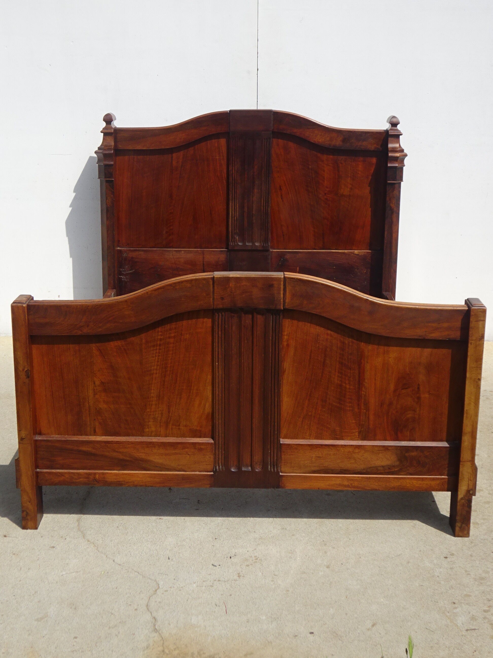 Walnut bed and walnut magnifying glass nineteenth century