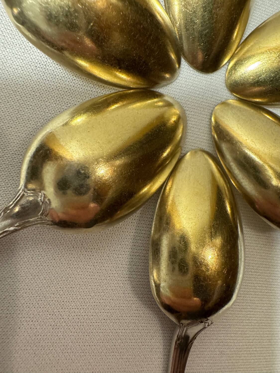 Six Christofle teaspoons, silver-plated vermeil