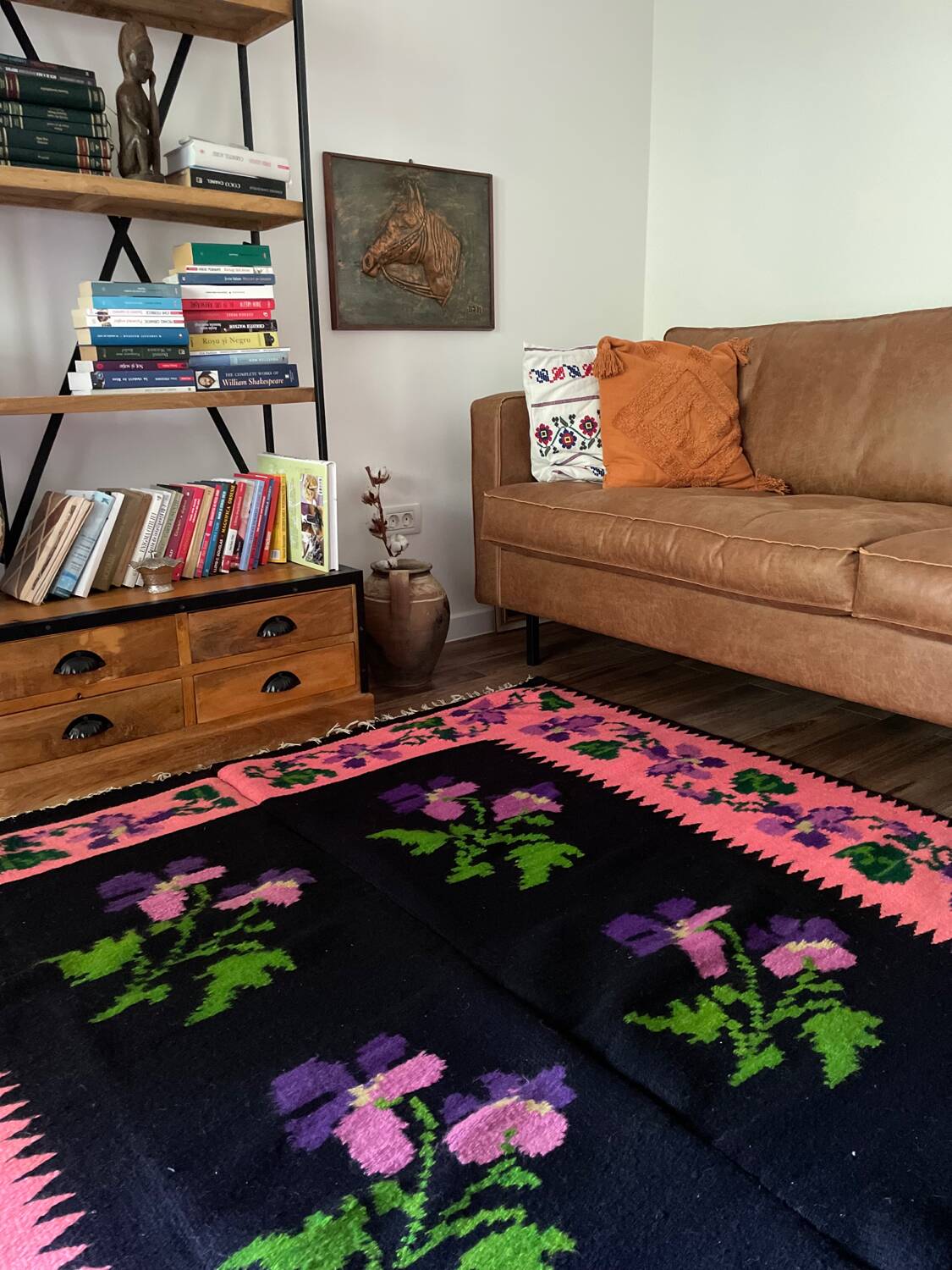 Oltenian floral rug handwoven in wool, purple flowers on black and pink background