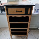 Raw oak and matte black storage cabinet on stencil top and transfer