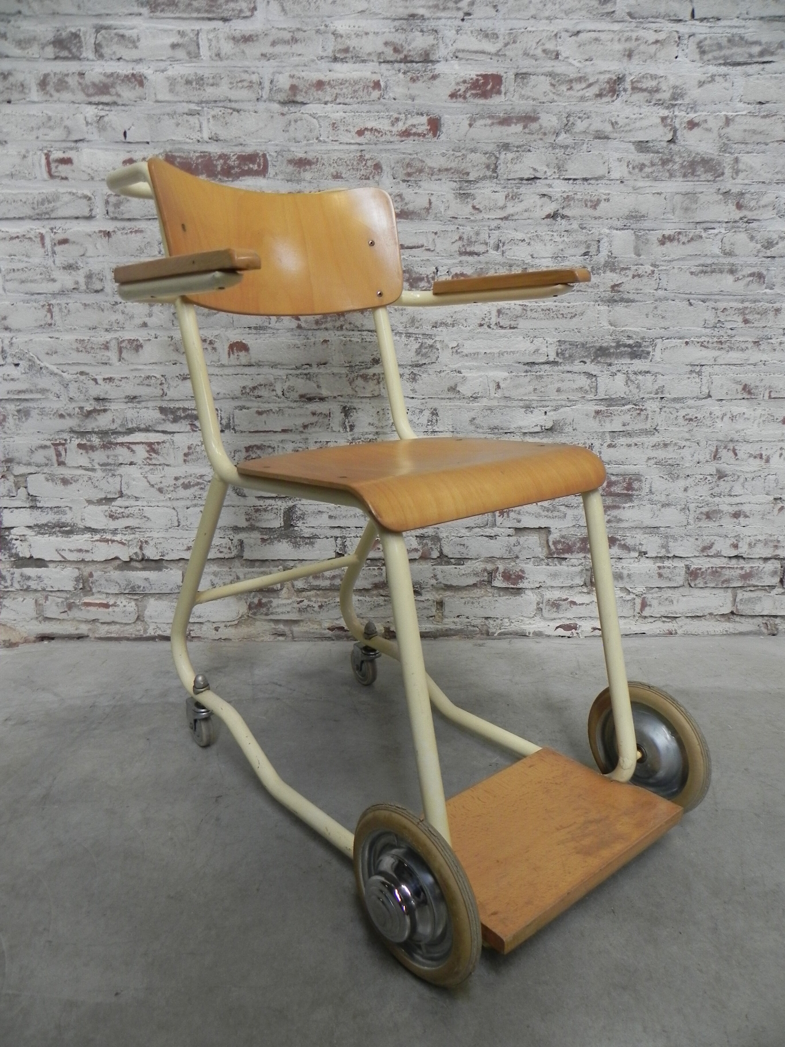 Vintage chair on wheels, wheelchair