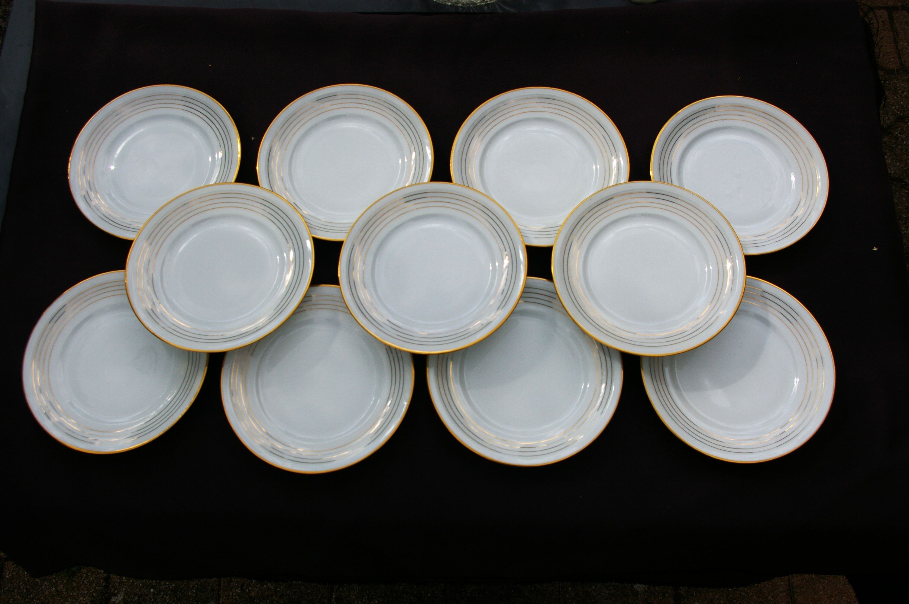 11 Dessert Plates in White Porcelain and Art Deco Gold