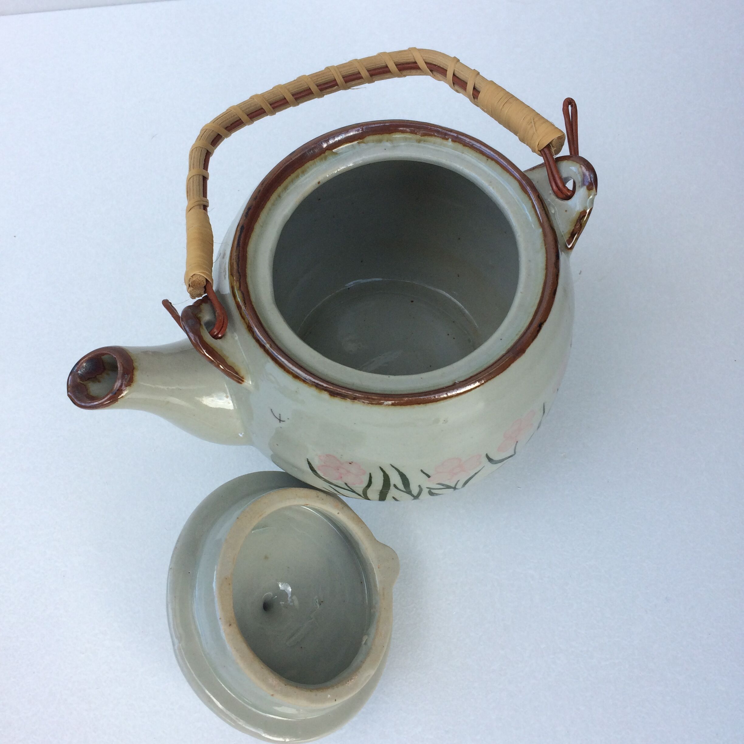 Vintage teapot wicker handle