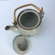 Vintage teapot wicker handle