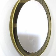 Vintage gold mirror by Mathieu Mategot for Artimeta from the 1950s with light.