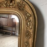 Golden fireplace mirror with pediment