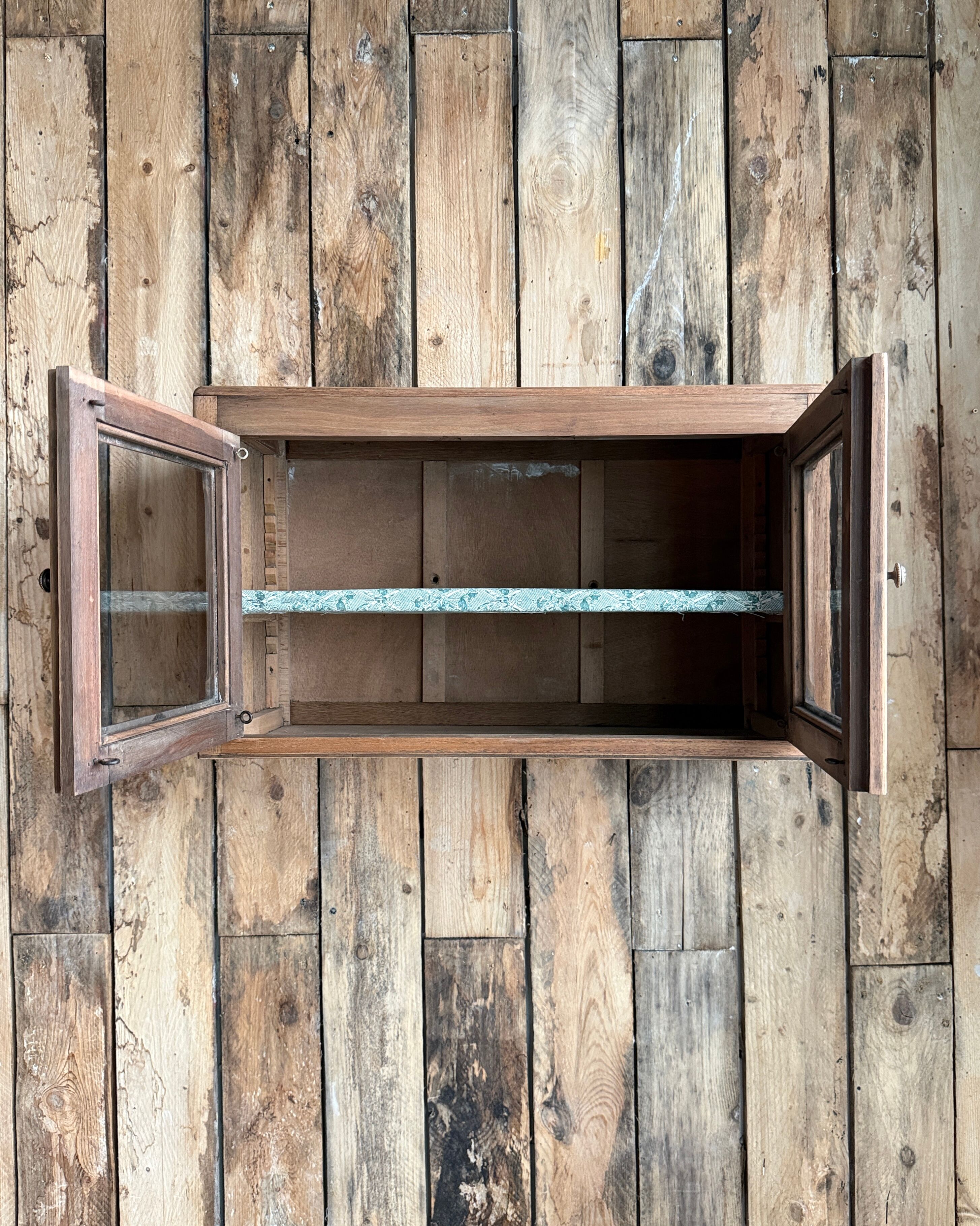 Small antique wall display cabinet in walnut.