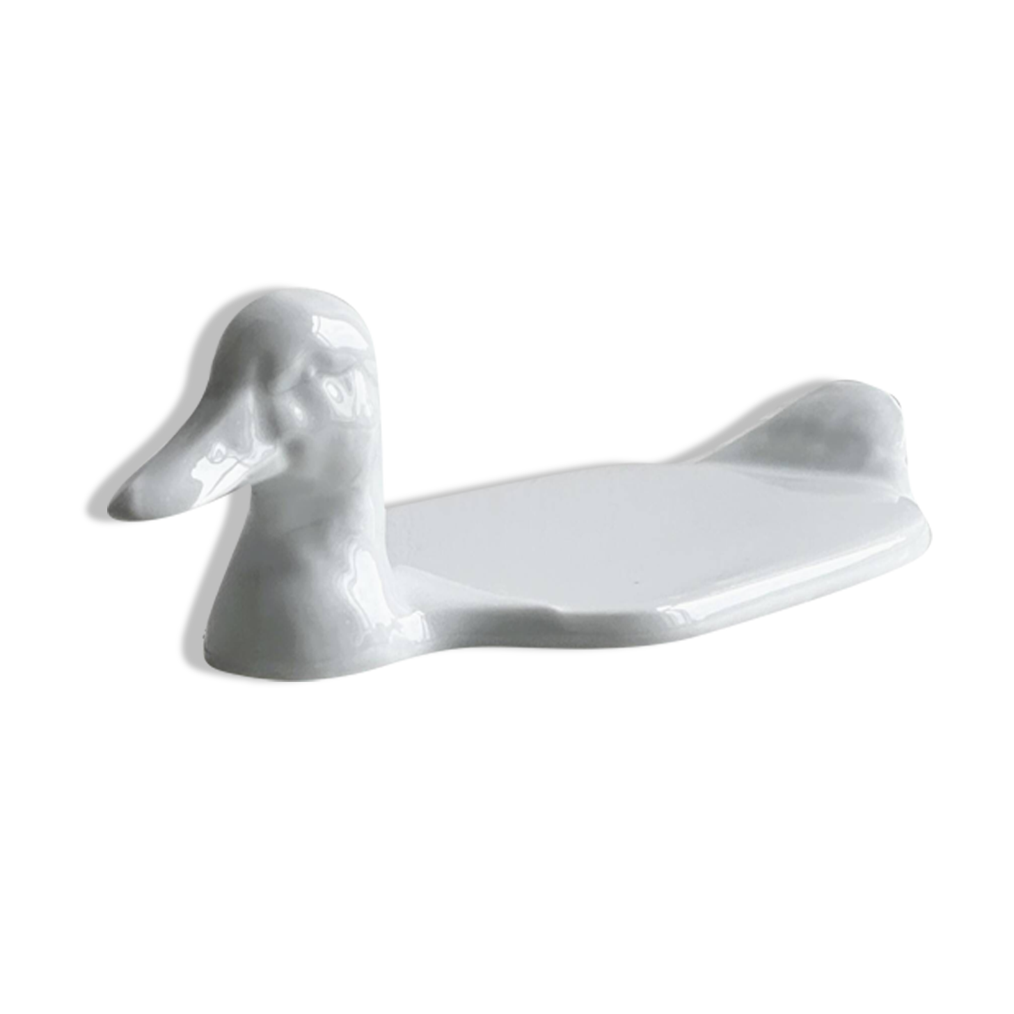 White porcelain dish in the shape of a duck.